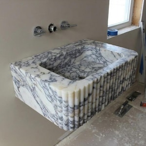 Lauri added a photo of their purchase