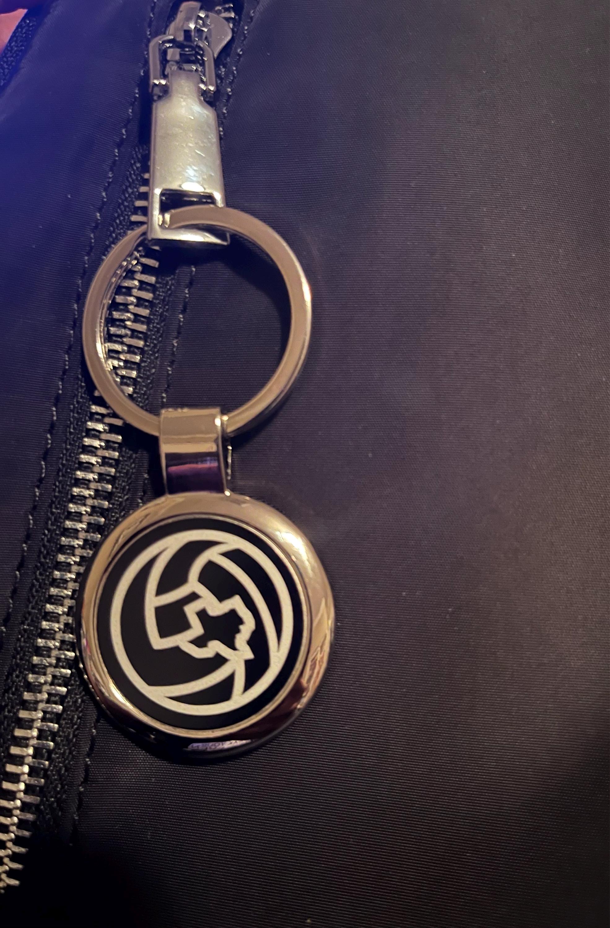 Customer photo of Custom Logo Etched Metal Keychain from Stephanie