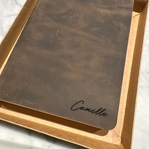 Camille added a photo of their purchase