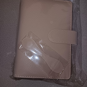 Angela added a photo of their purchase