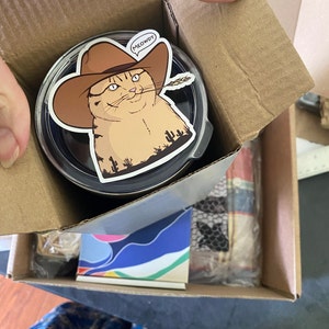 Elizabeth added a photo of their purchase