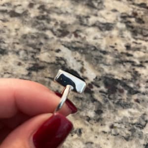 Lisa added a photo of their purchase