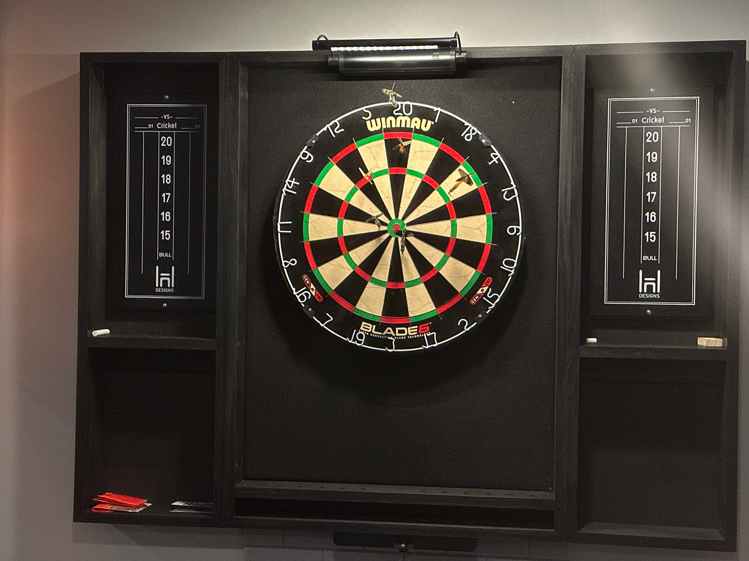 Makes a great fathers day gift  Our best selling Black dartboard cabinet with a Dartboard, darts, led light. and 2 scoreboards.