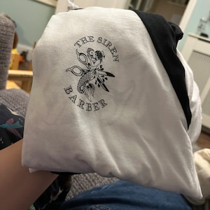 Jasmine added a photo of their purchase