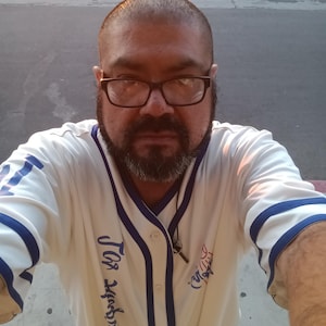 Luis added a photo of their purchase