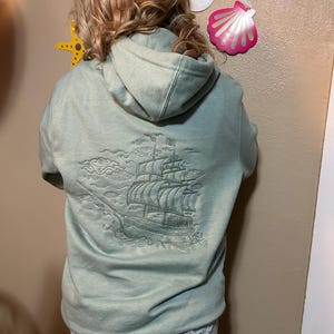 Colleen added a photo of their purchase