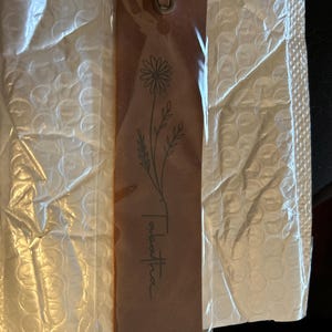 Mel added a photo of their purchase