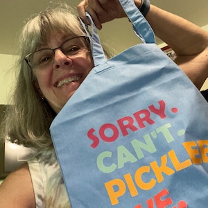 Leigh added a photo of their purchase