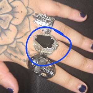 Aisha added a photo of their purchase