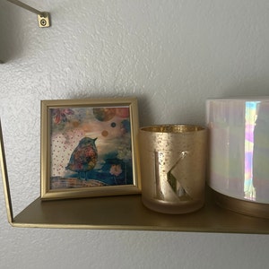 Kelly added a photo of their purchase