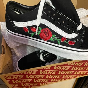 black vans with red roses