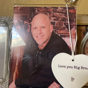 Alicia added a photo of their purchase