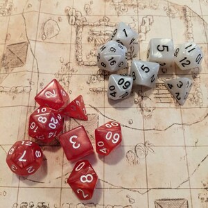 thumbnail image 2 of 7-Piece Translucent Pink & Green Swirl Polyhedral Dice Set – With Pink Dice Bag 2 of 6