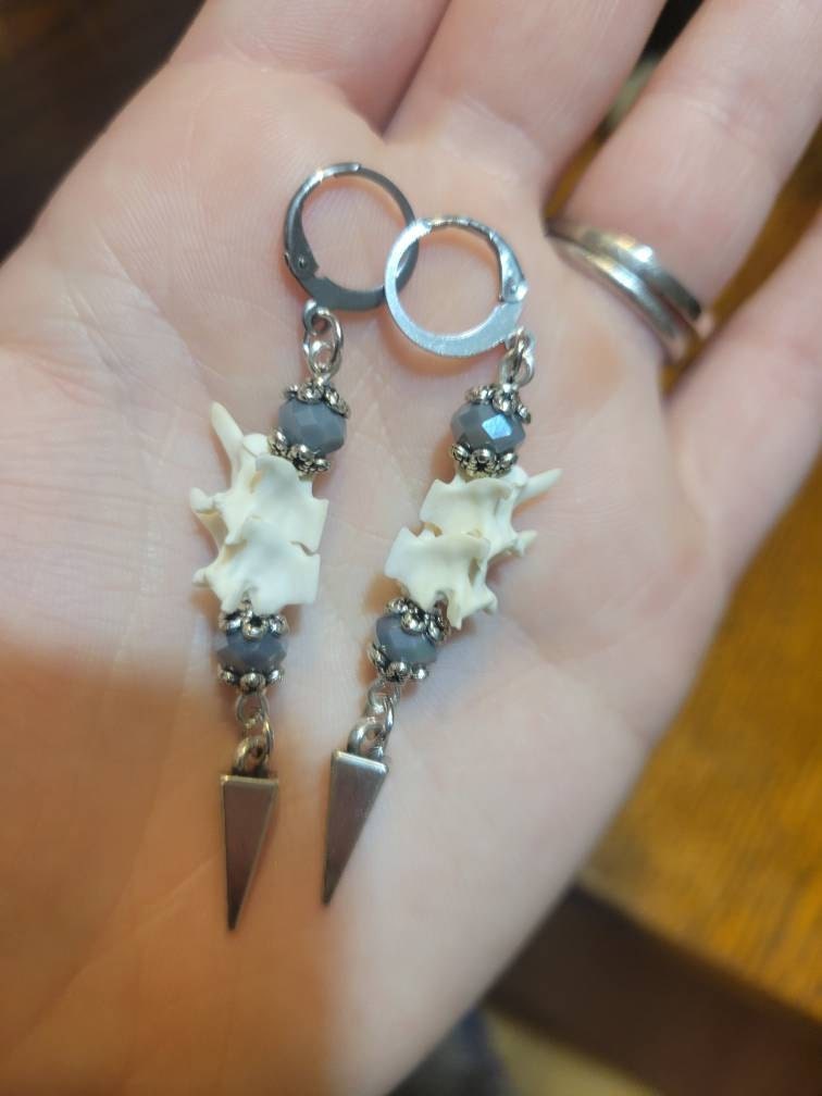 Exquisite Victorian-Era Inspired Coiled Rattlesnake Vertebrae Dangling, Earrings with Intricate Metalwork and Antique Brass Finish