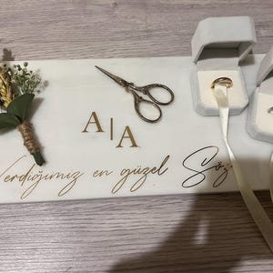 Azize added a photo of their purchase