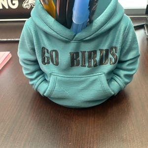 Taylor added a photo of their purchase