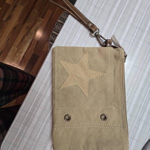 Sharon added a photo of their purchase