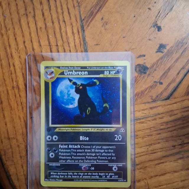 first umbreon pokemon card Umbreon 13/75 Neo Discovery 1st Edition CGC 8.5 – L.A. Mood Comics and Games