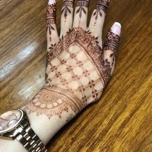 Malika added a photo of their purchase