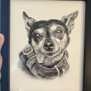 Liz added a photo of their purchase