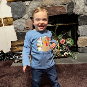 Shelley added a photo of their purchase