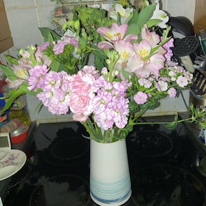 Katie added a photo of their purchase