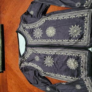 Valerie added a photo of their purchase