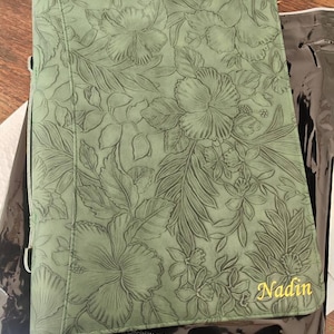 Carina added a photo of their purchase