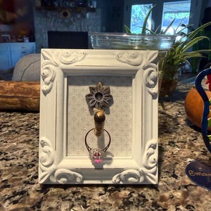 Cecilia added a photo of their purchase