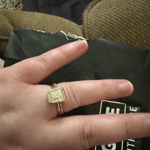 Caroline added a photo of their purchase