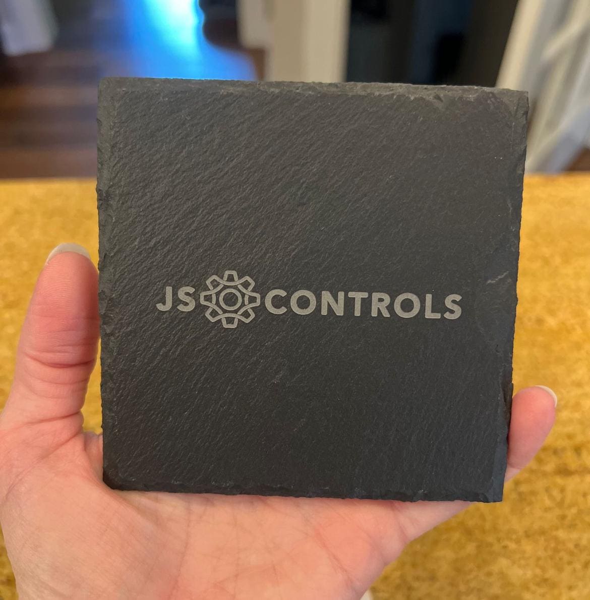 Customer photo of Custom Logo Engraved Slate Coaster from Jaime