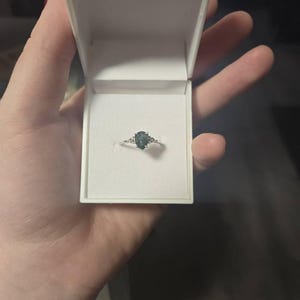 Miriam added a photo of their purchase