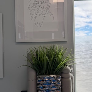 Arielle added a photo of their purchase