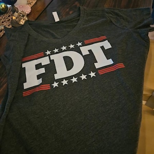 Cyndie added a photo of their purchase