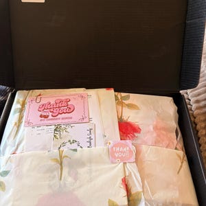 Emmie added a photo of their purchase