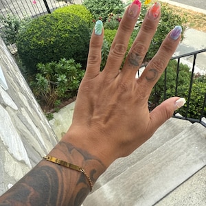 Roxana added a photo of their purchase