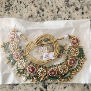 Pooja added a photo of their purchase