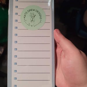 Sarah added a photo of their purchase