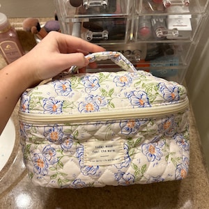 Olivia added a photo of their purchase