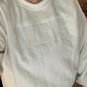Jenny added a photo of their purchase