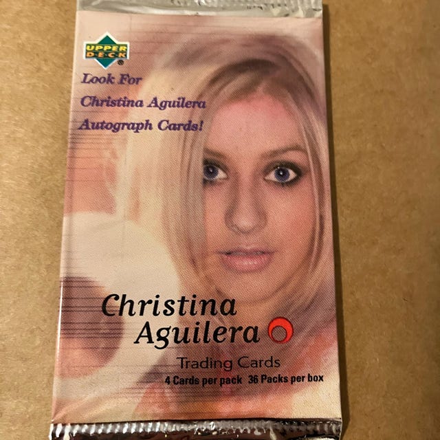 1 Pack of Christina Aguilera Vintage Trading Cards. 4 Cards per