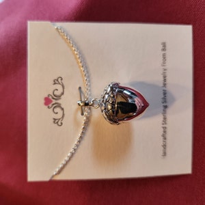 Marjorie added a photo of their purchase