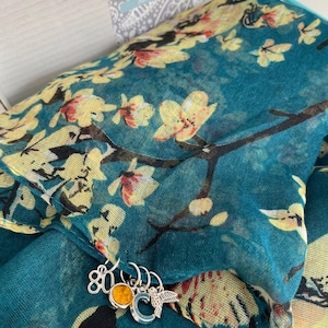Maxine added a photo of their purchase