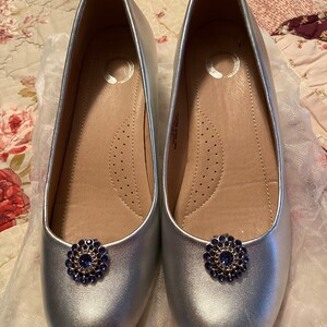 Loretta Houck added a photo of their purchase