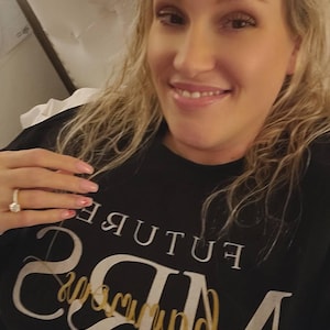 Sabrina added a photo of their purchase