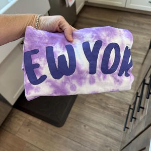 Amanda added a photo of their purchase