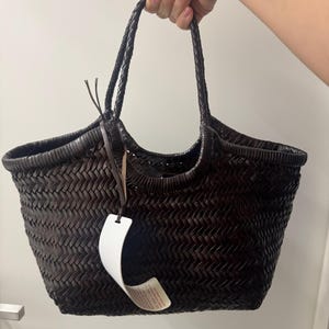 Yana added a photo of their purchase