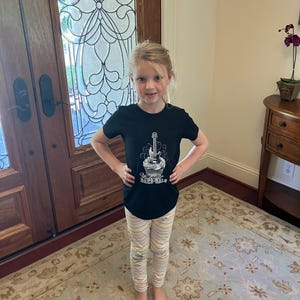 Laura added a photo of their purchase