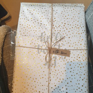 Naomi added a photo of their purchase