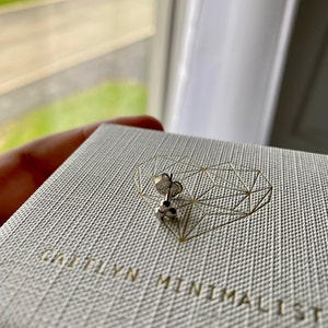 Gabriela added a photo of their purchase